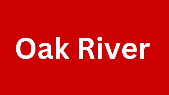 The words "Oak River" are written in white on a red background